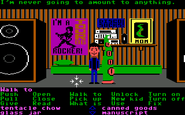 A screenshot from Maniac Mansion depicts a teenager and a tentacle monster in pixelated graphics. The interface includes a verb list in green text, including walk to, pick up, what is, and use, and an inventory list in purple, including “tentacle chow” and “glass jar.”