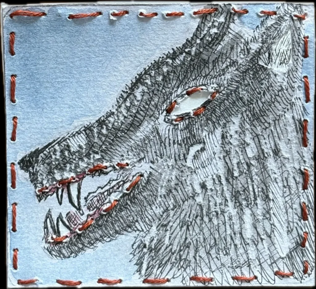 A toothy wolf. Colored pencil strokes on heavily textured paper, its jaws, eyes, and the whole piece outlined in chunky red stitching.